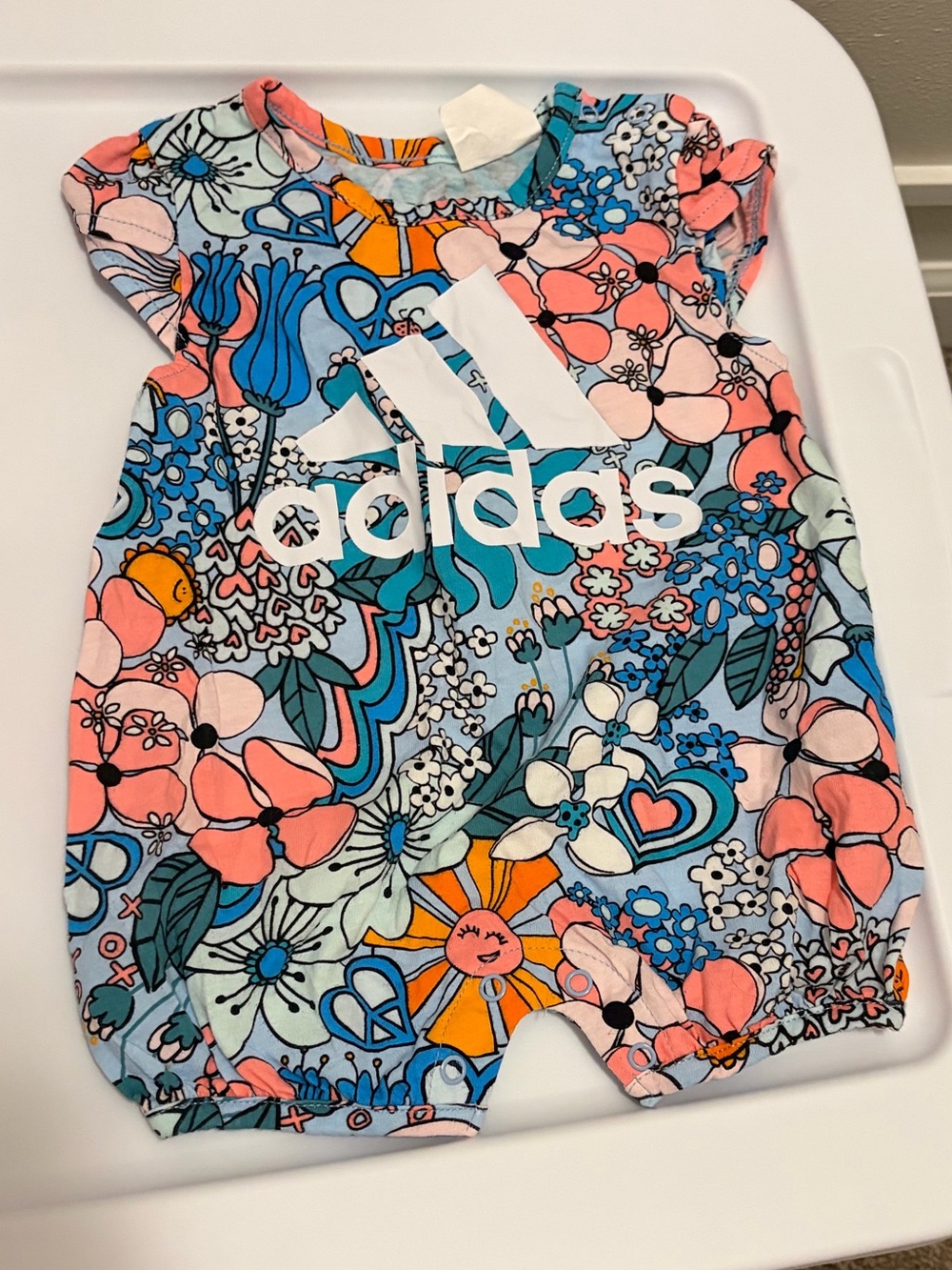 adidas Floral Logo Baby Romper in Pink and Blue